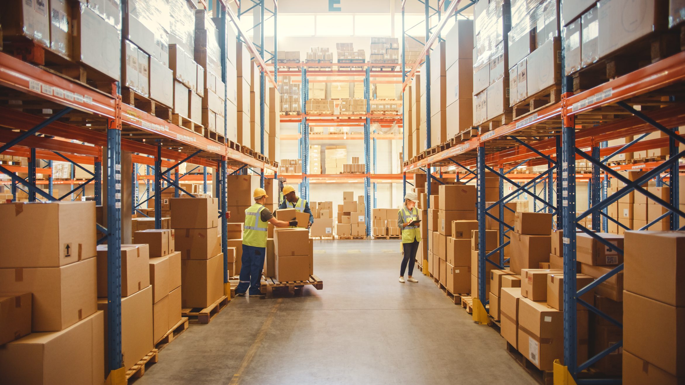 Warehouse facility with organized storage racks and logistics flow